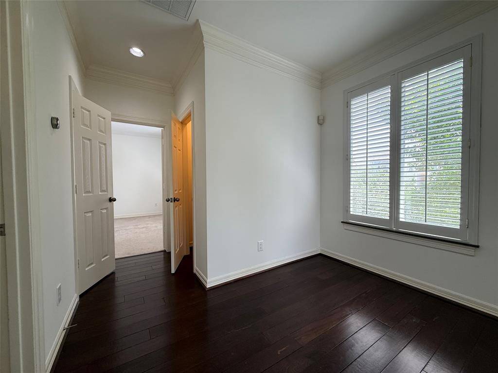 Alternate view of the 3rd floor bonus space. In the walkway to the third bedroom are two closets.
