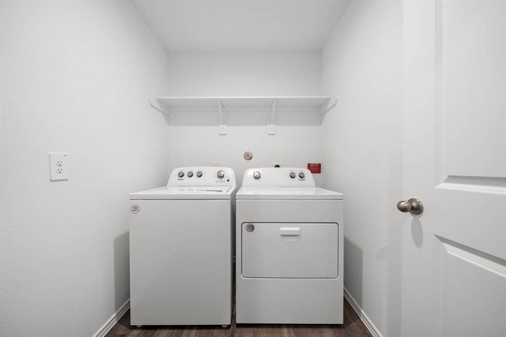 Brand new washer/dryer units in this central utility room.