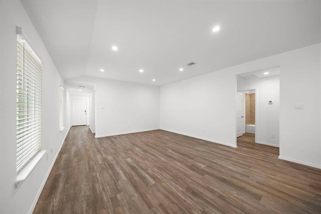 Modern LVP flooring throughout the common areas.