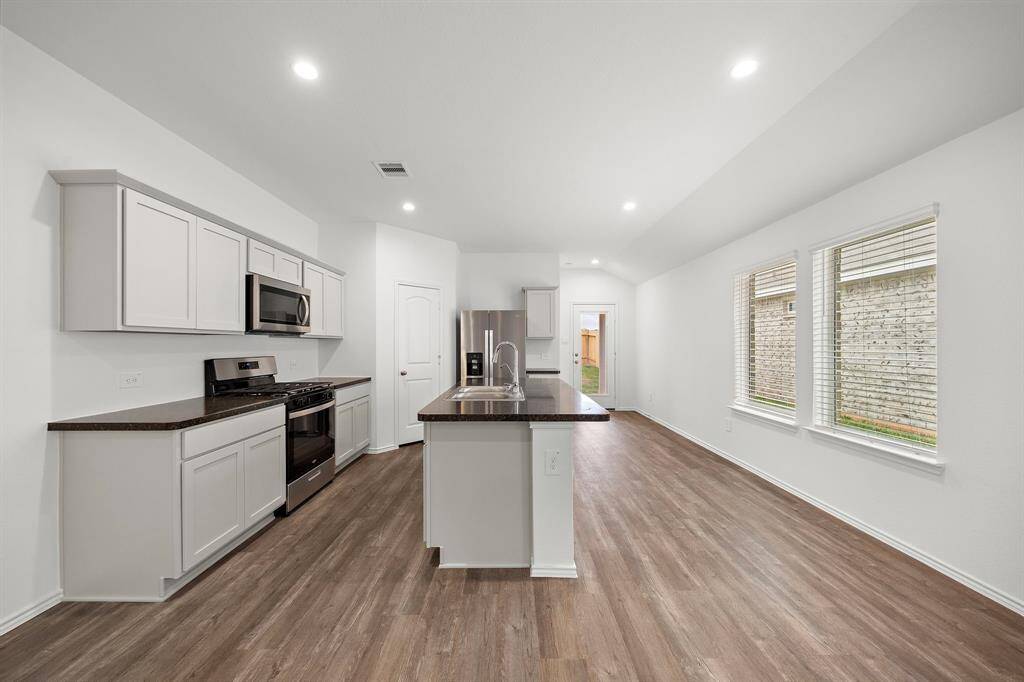 Contemporary grey cabinets.