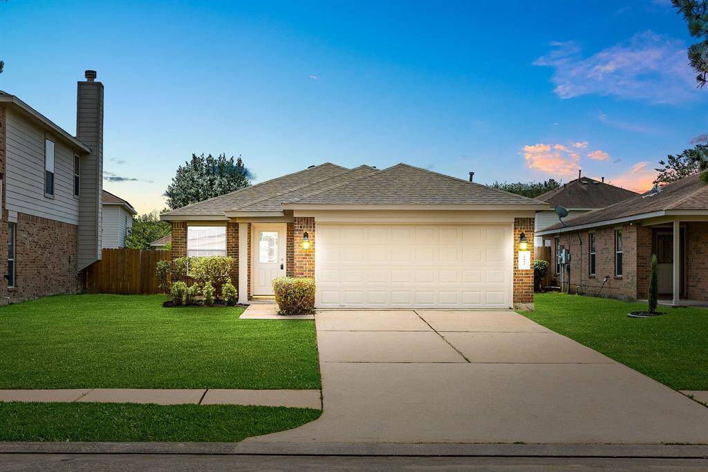 Welcome home to 2442 Pinpoint Drive located on a quiet street in the Park Spring community and zoned to Spring ISD! This stunning home has lovely curb appeal, a well-manicured lawn, beautiful landscaping, brick elevation, front door with glass detailing, covered front porch, traditional style, beautiful outdoor lanterns and a double wide driveway!