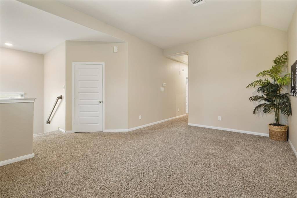 This fun game room looks like the perfect space for summer slumber parties and rowdy game nights. With its spacious layout and neutral finishes, it’s ready for laughter, lounging, or a little friendly competition.