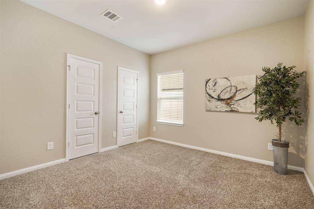 With four spacious bedrooms, you will always have room for company. This bedroom offers soft neutral carpet and paint, plenty of closet space, and easy access to the full bathroom.