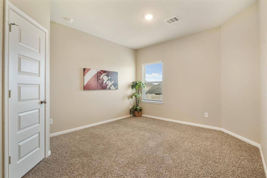 Your family and guests will rest comfortably in this inviting bedroom with plush carpet, neutral paint, a large closet, and ample space for furniture, games, toys and more.