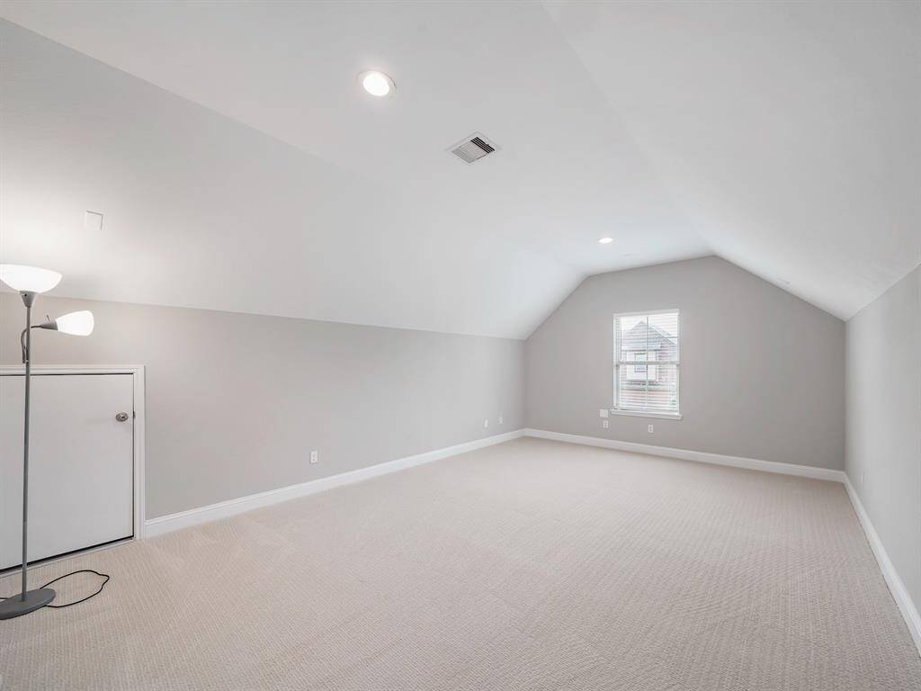 Doorway leads to a huge storage space that would be perfect for seasonal decor!
