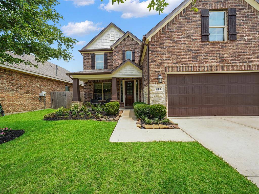 Picture yourself captivated by the curb appeal of this home, highlighted by its charming covered front porch!