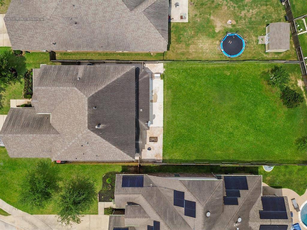 Aerial view of the expansive backyard