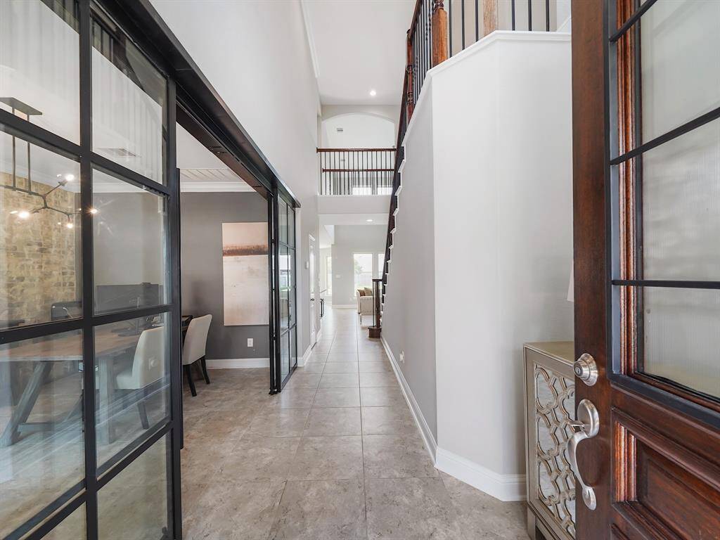 Step inside to discover a freshly painted interior, tile flooring, and plush new carpeting that exudes modern sophistication.