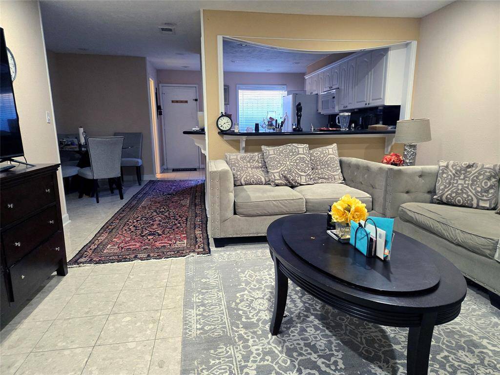 Kitchen and dining open to the living area