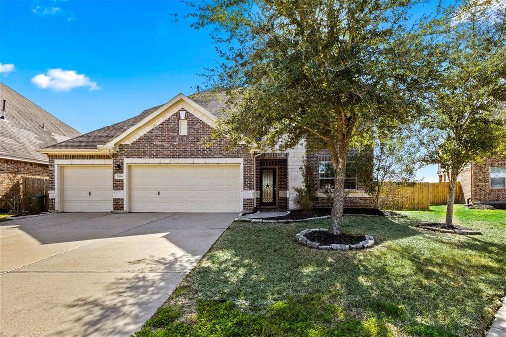 3 car garage and ample parking