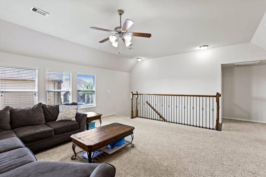 Centrally located game room upstairs creates division and privacy for the four upstairs bedrooms