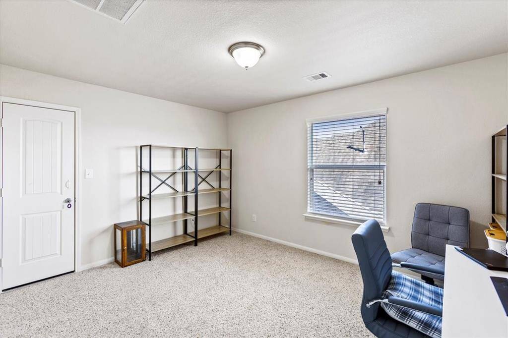 Third Upstairs bedroom currently used as an office