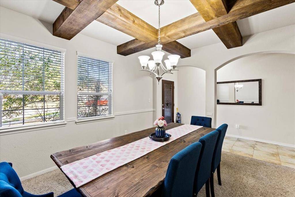 Custom beams give this room so much character!