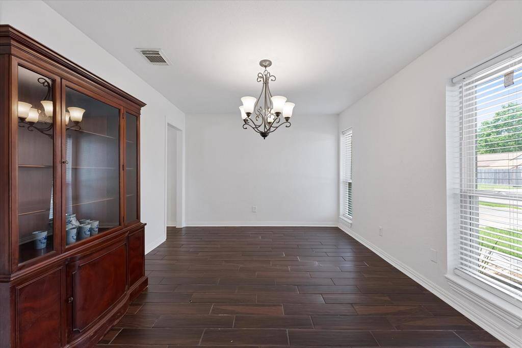 Tile flooring flows through the living areas of the home.