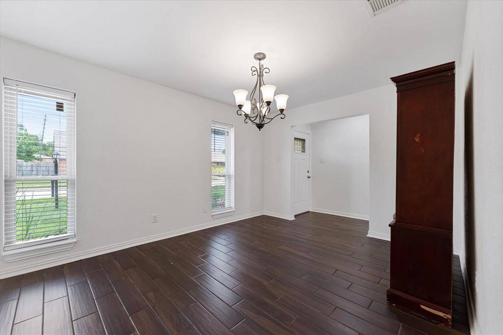 Spacious dining room or great home office.