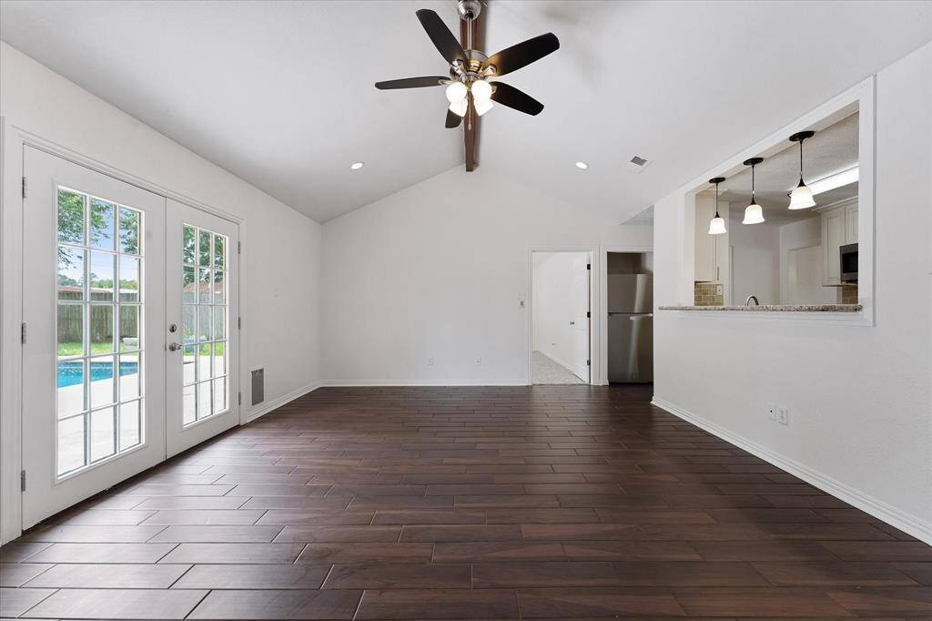 View to the backyard from the living room and kitchen