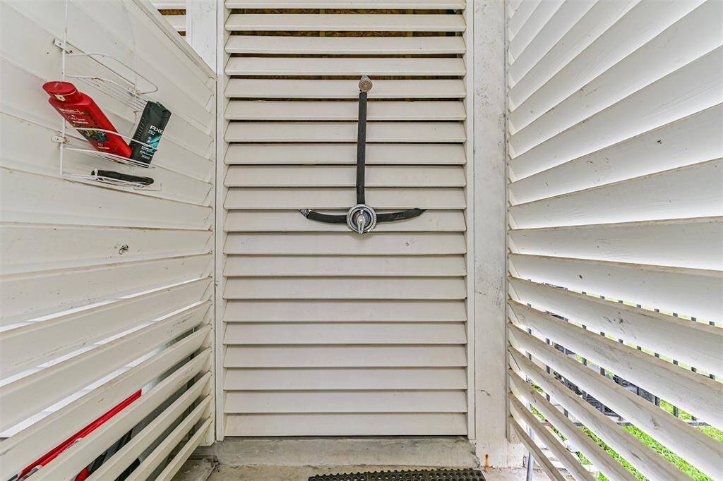 Outdoor shower to wash the sand from the beach off your feet!