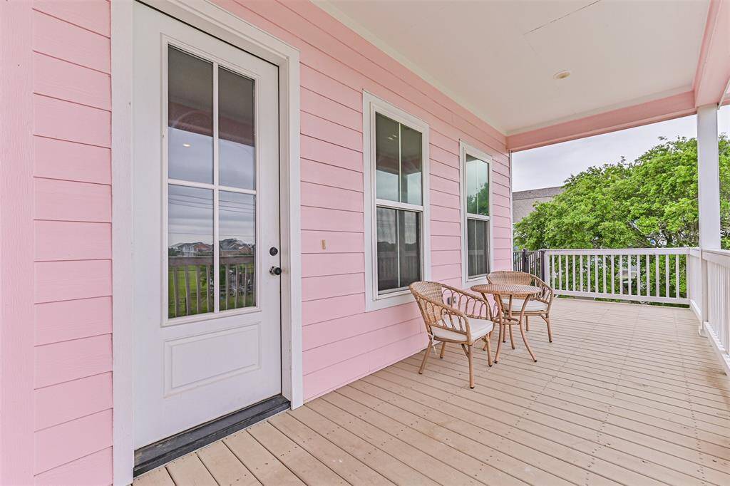 Front entrance to the house with shaded deck