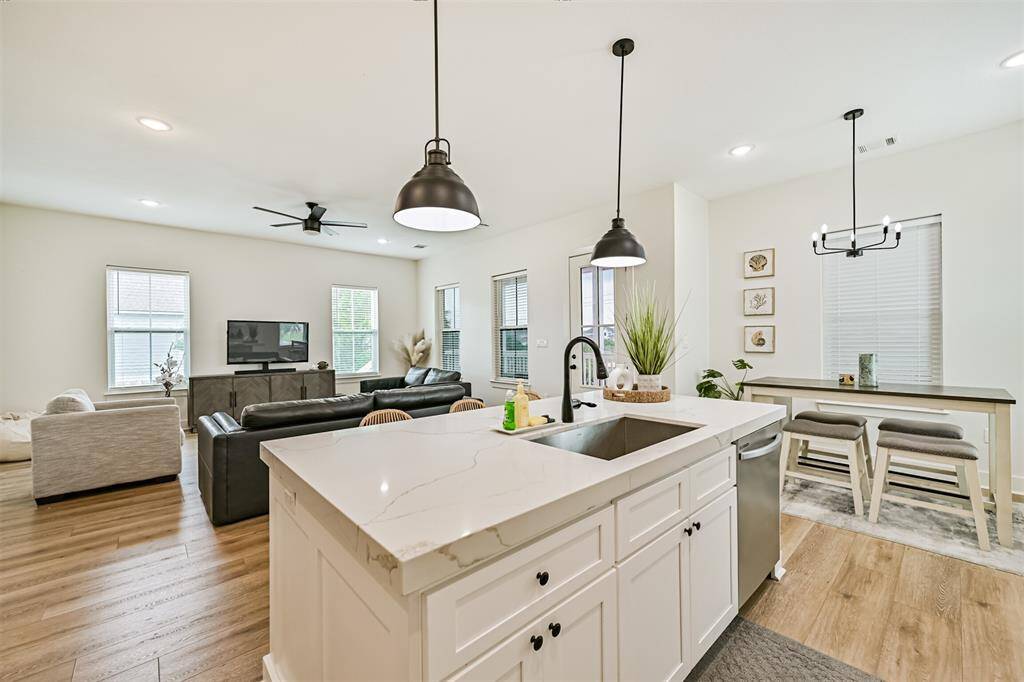 Open floor plan with dining/living and kitchen open to each other.