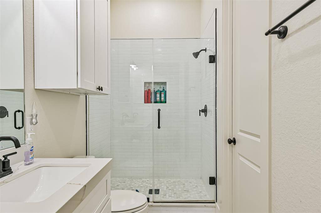 Spacious walk in shower.