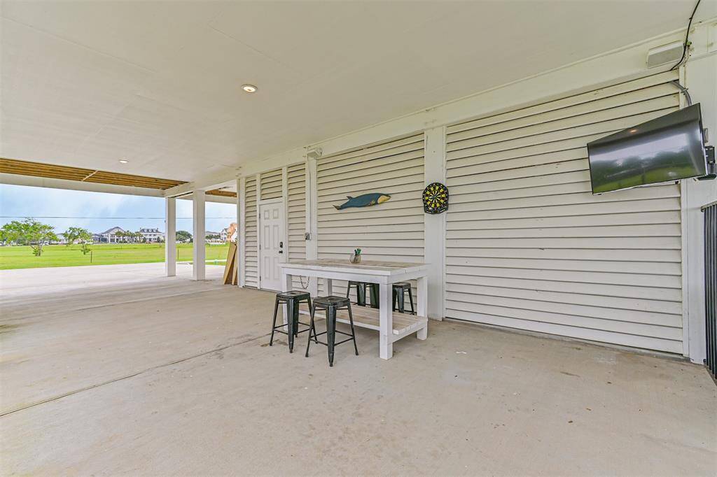 Enjoy the football game from the outside entertainment area.