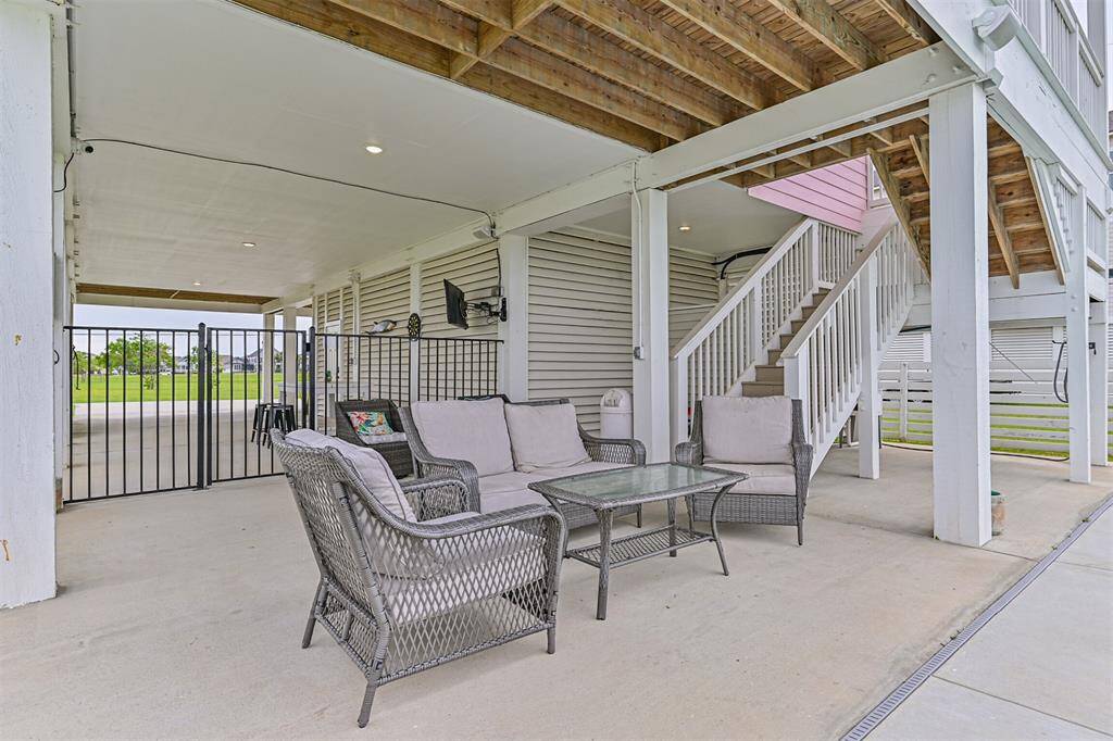 Nice, shaded patio area to enjoy poolside.