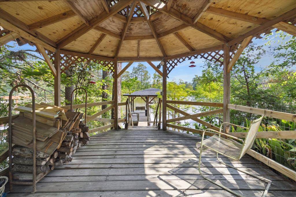 Gazebo overlooks water. Gazebo roof - Aug 2024