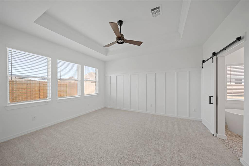 Spacious primary suite (*Photo not of actual home and used for illustration purposes only.)