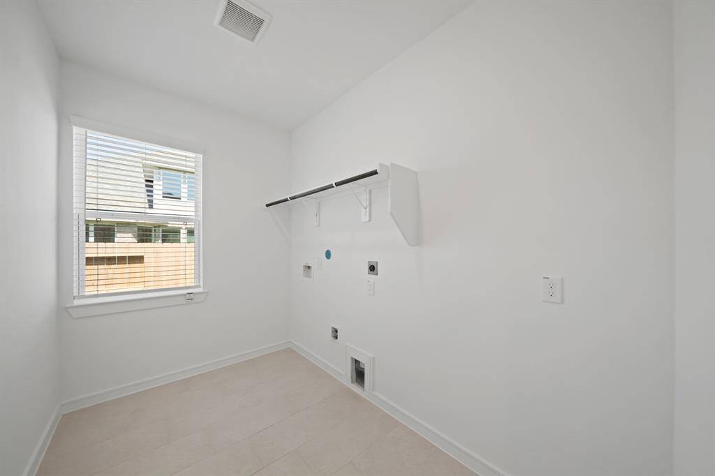 Laundry room (*Photo not of actual home and used for illustration purposes only.)
