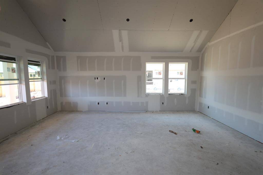 Bright open living space with vaulted ceilings - still under construction!