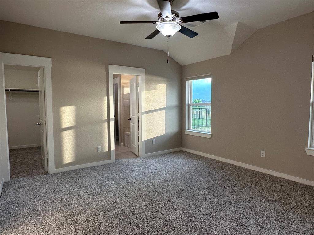 Primary bedroom (Walk-in closet and adjoining bath.)
