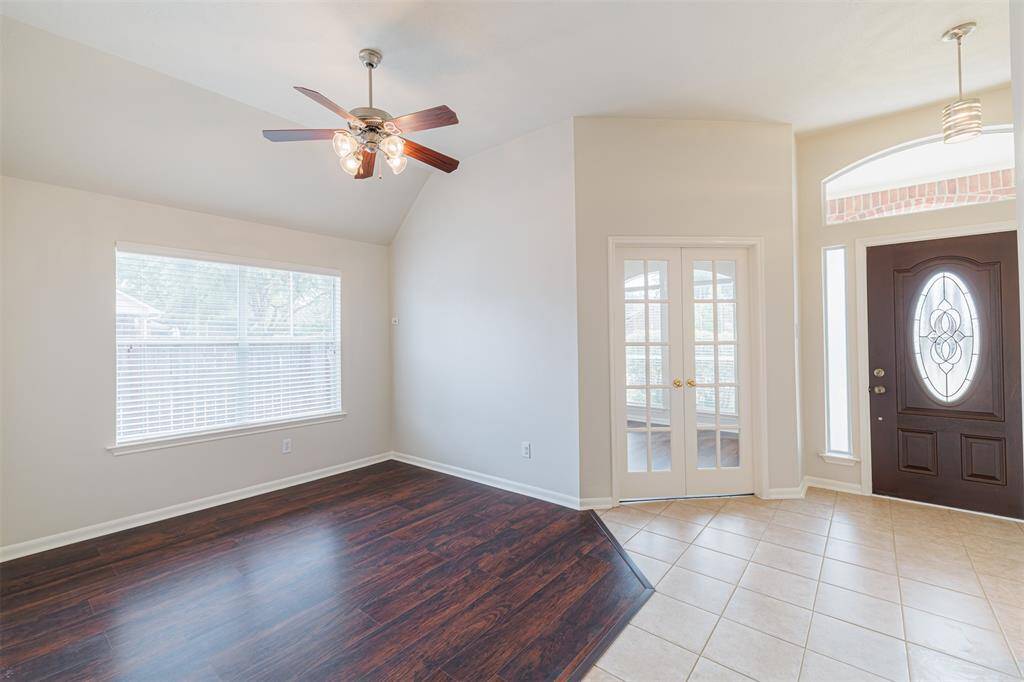 A formal dining room sits just off the entryway.