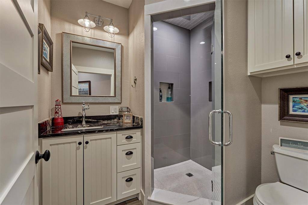 A full bath on the second floor is conveniently located near the bedroom and just steps from both the game room and media room.