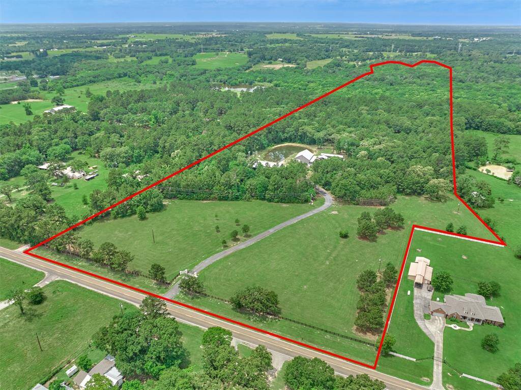 Let's take a look at the overall property: Over 39 acres of land offer endless possibilities! A gated private driveway winds through land and mature trees, leading to the existing home tucked away for ultimate privacy. The expansive, tree-filled acreage behind the home provides a serene backdrop and is ideal for building additions to the property, recreational use, or long-term investment potential. The red outline gives a visual of the property, refer to survey for specific property outline.