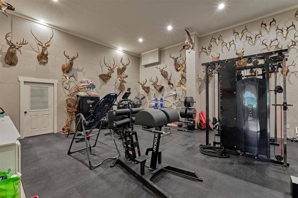 Stay active without leaving home in this dedicated gym space—perfect for workouts any time of day. Gym equipment is negotiable with the sale.