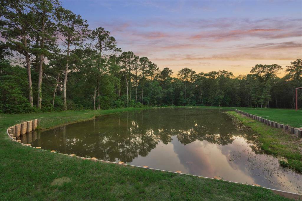 A pond on the property makes a beautiful backdrop and is perfect for fishing!