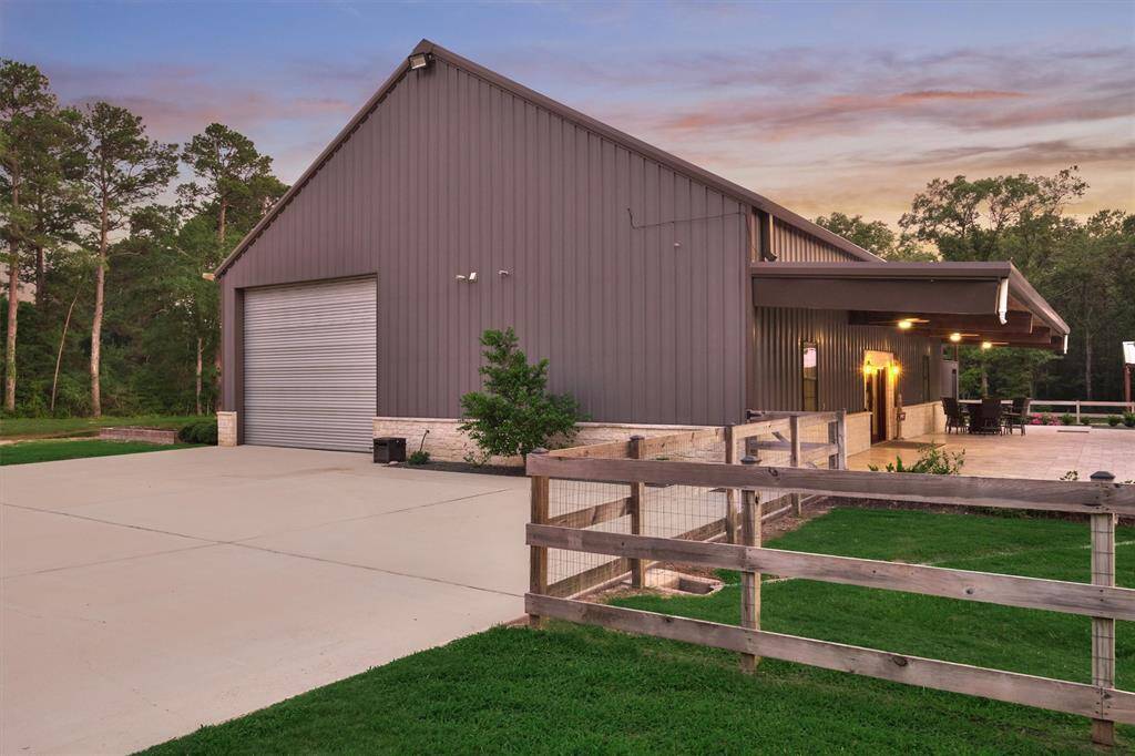 The home's garage is easily accessible from the concrete driveway.