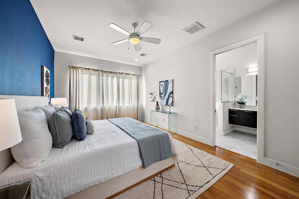 Enjoy direct access to an expansive walk-in closet and private ensuite bath, with a functional layout providing exceptional comfort and everyday convenience.