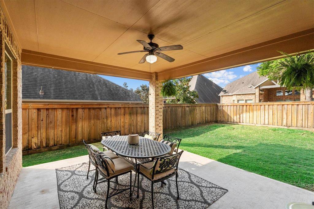 The extended back patio offers ample space to unwind, entertain, or enjoy outdoor dining. Whether you’re grilling, relaxing, or hosting gatherings, this versatile area adapts to suit your lifestyle, creating the perfect outdoor retreat.
