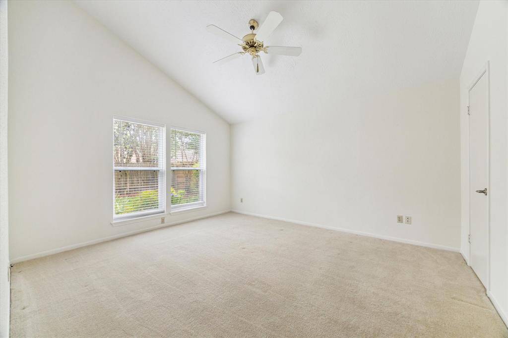 This private owner’s retreat is a great space to begin and end your day. This suite offers plush carpet, neutral paint, a soaring ceiling, large closet and an ensuite bathroom.
