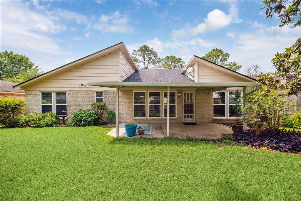 Whether you're hosting lively gatherings or seeking tranquility after a long day, this back yard paradise with a covered patio promises to provide the perfect space where memories are made and stress melts away.