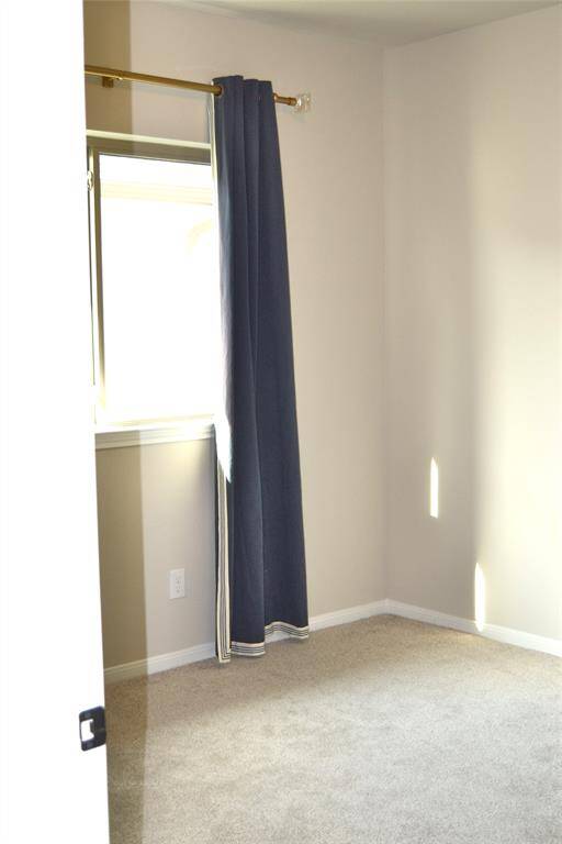 Beautiful curtains in this bedroom.