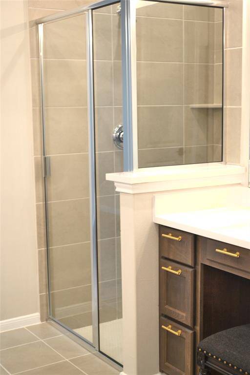 Walk in shower features bench seating