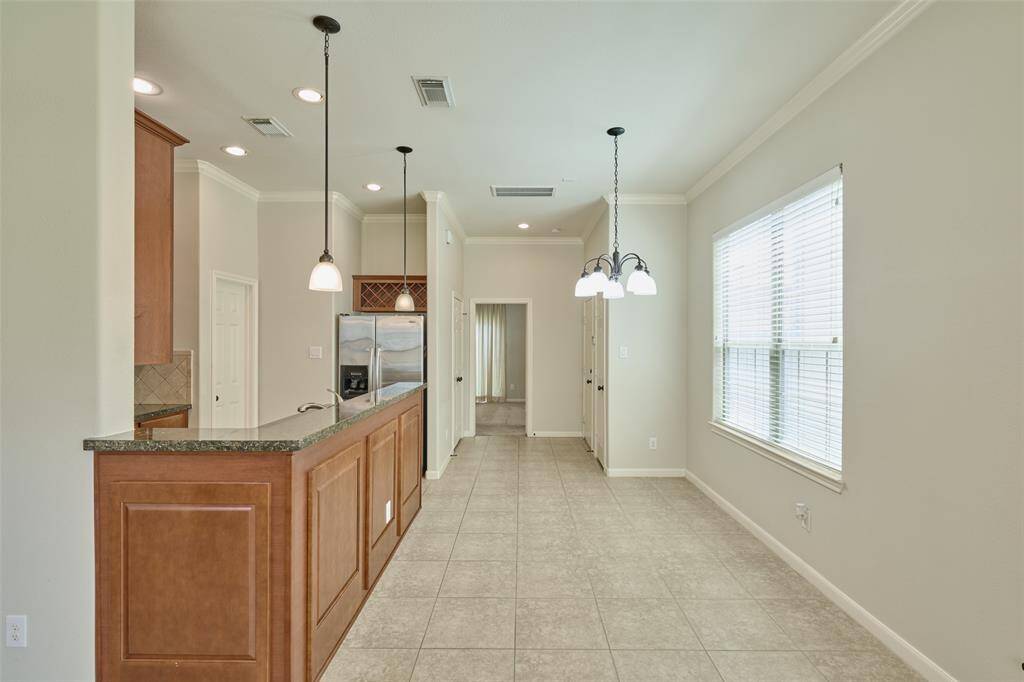 Living area open to kitchen and dining areasdining areas