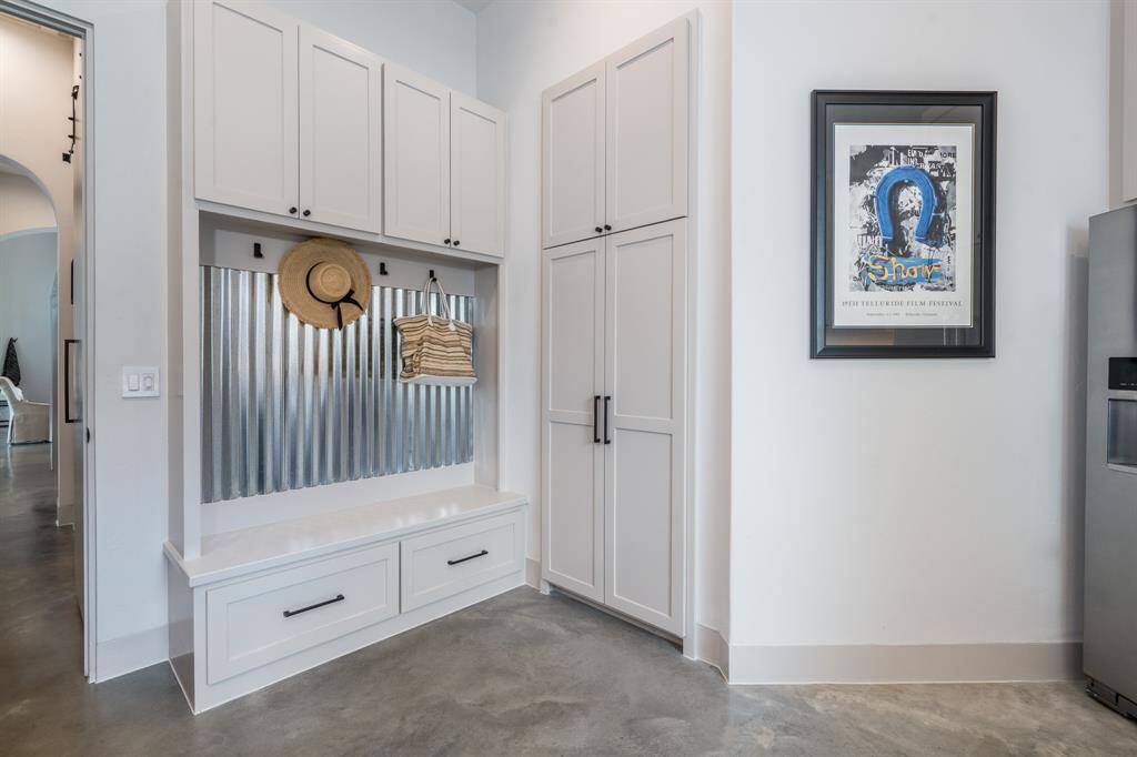 Large Utility Room completely built out to maximize storage