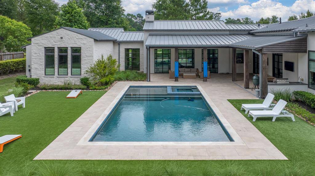 Pool and hot tub, surrounding sundeck with astroturf.  Perfect for the outdoor games