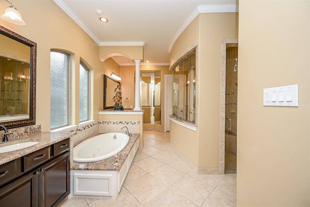 Beautiful Primary Bath Room with Garden Tub and Huge Walk in Shower