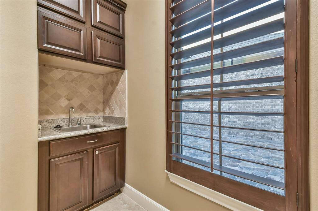 Utility Room/Laundry Room with custom built in sink