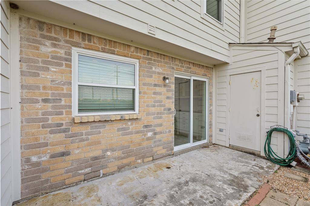Enjoy seamless indoor-outdoor living with a sliding glass door that opens directly from the kitchen and dining area to your private back patio. This versatile space is perfect for grilling, gardening, or creating a cozy outdoor retreat.
