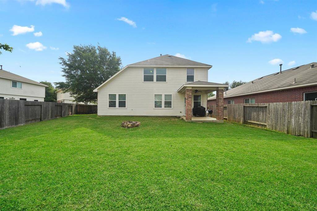 Sizable backyard is ready for you to add a garden, swing set, or a trampoline.